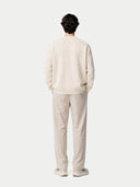 back view of a cream sweater and pants on a white background #color_off-white