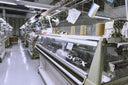 Rows of Shima Seiki MACH2X knitting machines in GOBI’s knitting factory