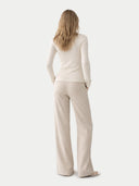 back view of a beige outfit with a white background #color_coconut-milk
