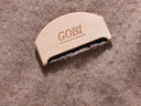 Gobi brush on a textured brown background
