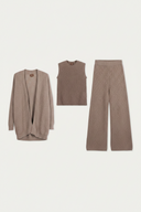 Three-piece knit loungewear set in a taupe-brown color, including a cardigan, a sleeveless vest, and wide-leg pants, laid flat on a light off-white background. #color_taupe