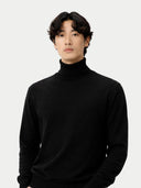 Man wearing a black turtleneck sweater against a white background #color_black