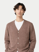 Man wearing a brown cardigan over a white shirt on a white background #color_taupe