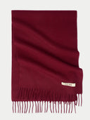Maroon scarf with fringes and 'Gobi' label on a white background #color_bordeaux