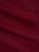 Close-up of dark red fabric texture #color_bordeaux
