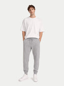 front view of a Person wearing a white t-shirt and gray sweatpants on a white background #color_vapor-blue