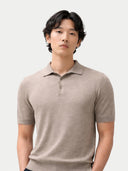 Man wearing a beige polo shirt against a white background #color_timber-wolf