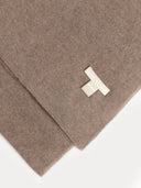close up of a brown scarf with a small label "GOBI ORGANIC"