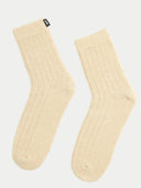 Pair of beige socks on a white background #color_beige