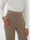 close up of a brown ribbed pants waist #color_taupe