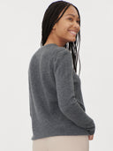 close up back view of a gray sweater and white pants on a white background  #color_stone-gray