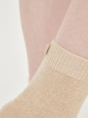 close up back view of beige socks #color_beige