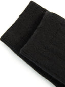 close up of black socks shinbone side #color_black