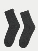 Pair of dark gray socks with a dark small label "GOBI" on a light gray background #color_charcoal