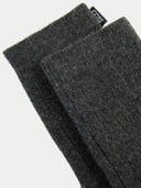 Pair of dark gray socks with a pattern,a dark small label "GOBI" on a white background #color_charcoal