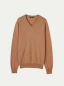 A beige Essential Cashmere V-Neck Sweater on a plain background. #color_sheepskin