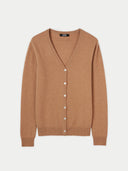 A beige v-neck cashmere cardigan with button closures on the front. #color_sheepskin